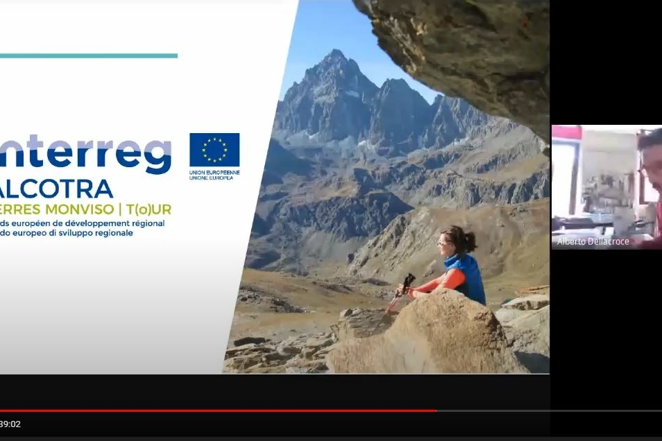 Un fermo-immagine del webinar con il titolo, una foto del Monviso e uno dei relatori