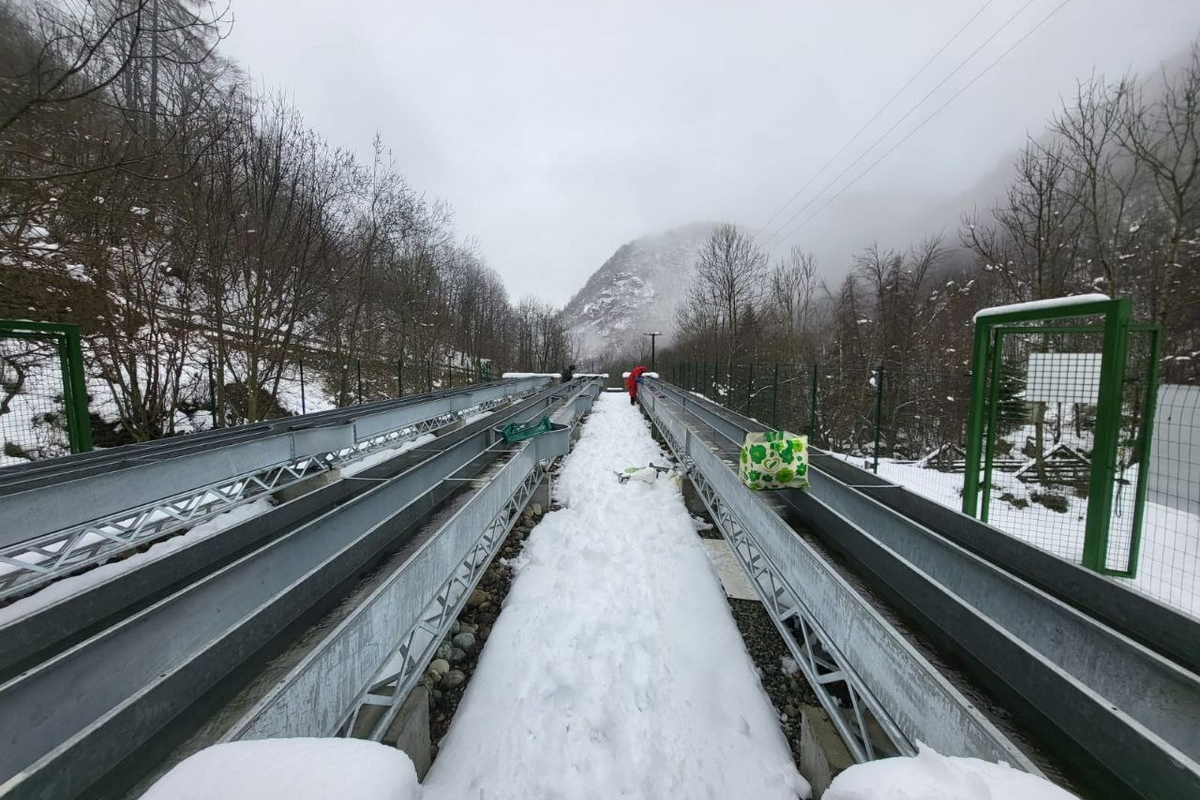 the artificial channels in Alpstream. In the picture, the artificial channels filled with boulders and the snow all around.